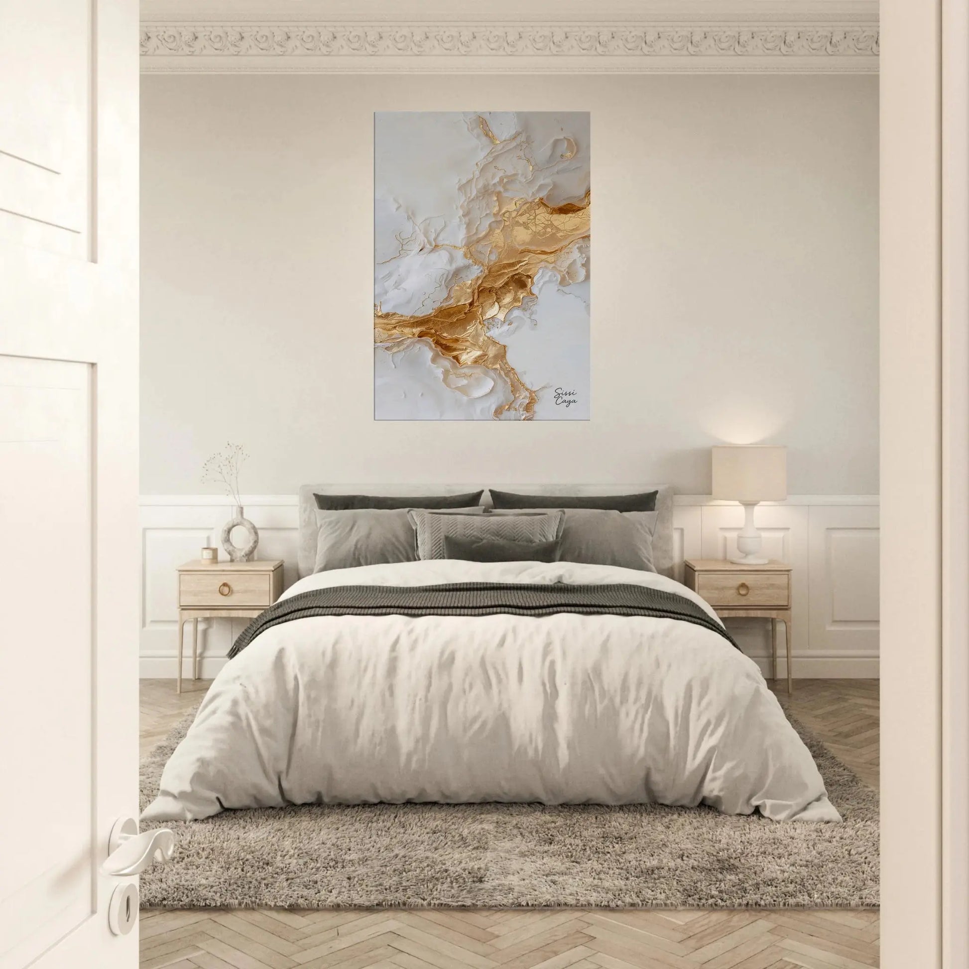 White and gold abstract artwork symbolizing calm and harmony, displayed above a bed in a cozy bedroom, fine art print by Sissi Caya.