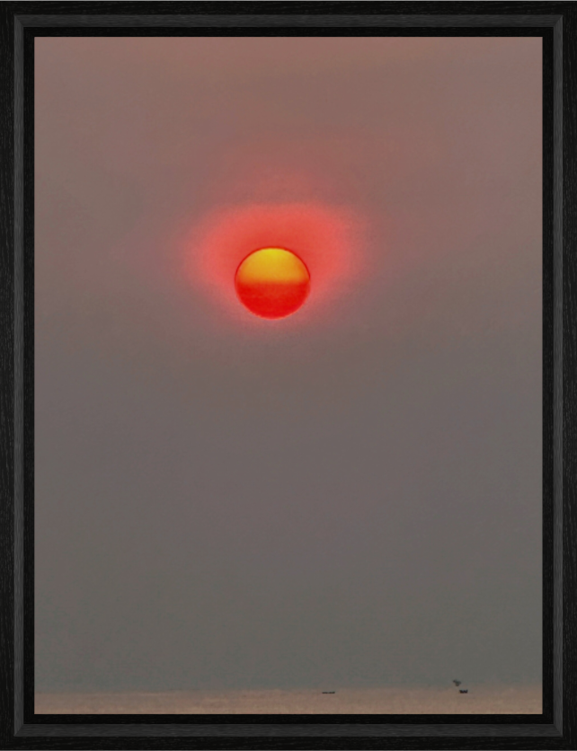 Intense red sunset over the horizon in Zanzibar - fine art photography by Sensorial Atelier